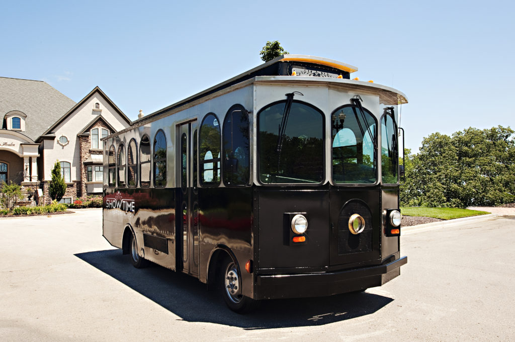 Showtime Transportation Kansas City Black and Silver Trolley near Chateau Avalon