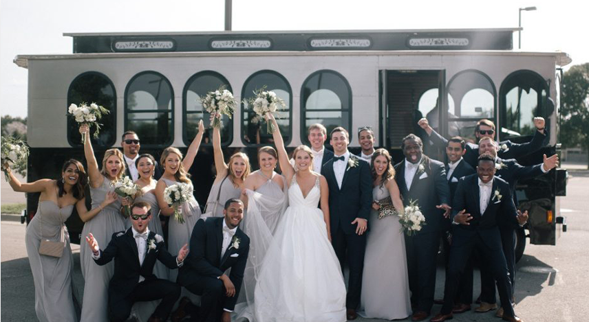 Showtime Transportation About Us Happy Wedding Party by Trolley
